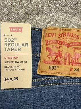 LEVI'S 502 REGULAR TAPER FIT STRETCH JEANS MEN'S 34X29 PANDA